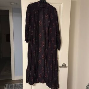 Gorgeous, sheer overdress. Beautiful button details. Rayon and linen